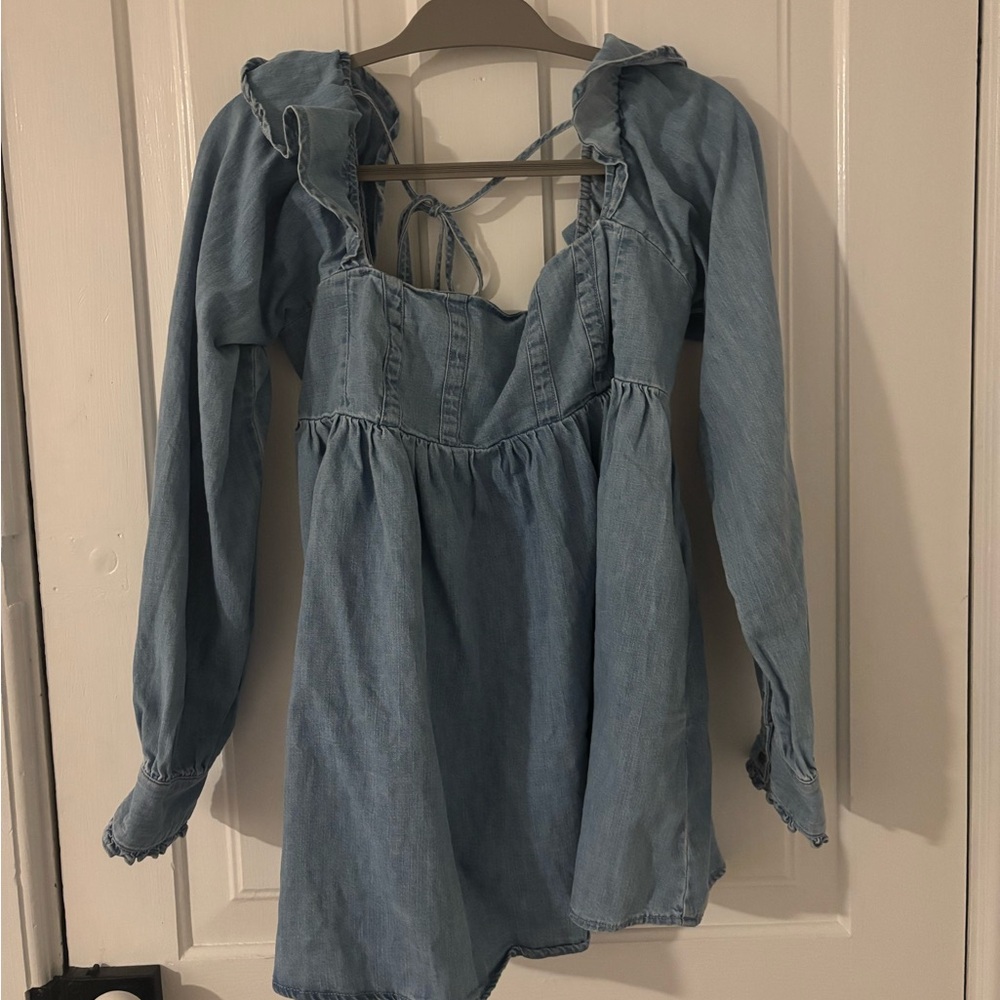 Free people tunic. Never worn and new with tags. Not sold anymore... SUPER CUTE!